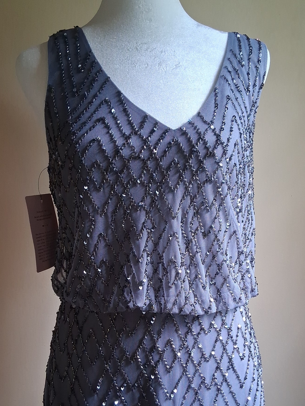 Elegant, Beaded V- shaped Neck Line